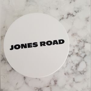 Jones Road Flushed half of 1.75 oz container